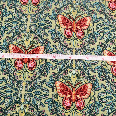 Folk Flora, Mirrored Butterfly Green, Caroline Alfreds - Sunnyside Fabrics UK - 3 wishes,3 wishes fabric,3 Wishes Fabrics,Autumn foliage,berries,Butterflies,falling leaves,pumpkin,pumpkins,quilting fabric,toadstools - alt - sunnysidefabricsuk.com