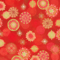 A close-up of a red patterned fabric or wallpaper featuring repeating mandala and starburst motifs in pale yellow-green and pink.