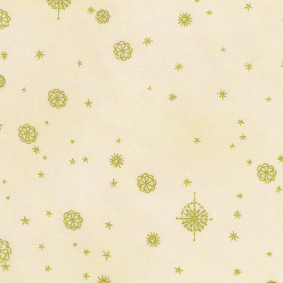 A close-up of a cream-colored fabric with a repeating pattern of small gold stars and floral snowflake motifs.